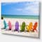 Designart - Adirondack Beach Chairs - Seashore Photo Canvas Art Print